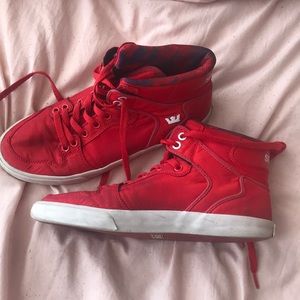Red supra high tops